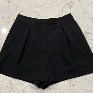 Black pleated high waisted shorts